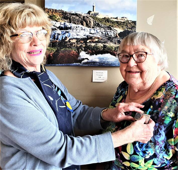 President Louise Starkie pinning Mary Conley as the new Patron of Narooma Branch CWA.