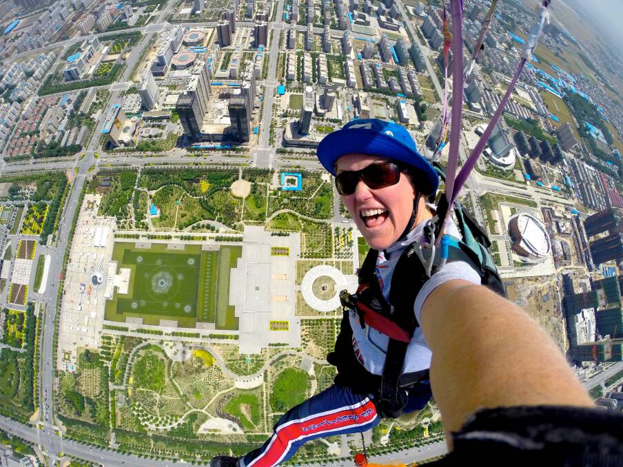 ON HIGH: Jules McConnel demonstrates her higher powers in China. She is off to 2018 World Parachuting Championships on the Gold Coast in October.