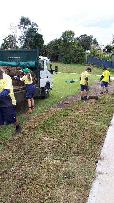 Eurobodalla Shire Council crews lay fresh turf at the Batemans Bay water garden on Thursday, February 21.