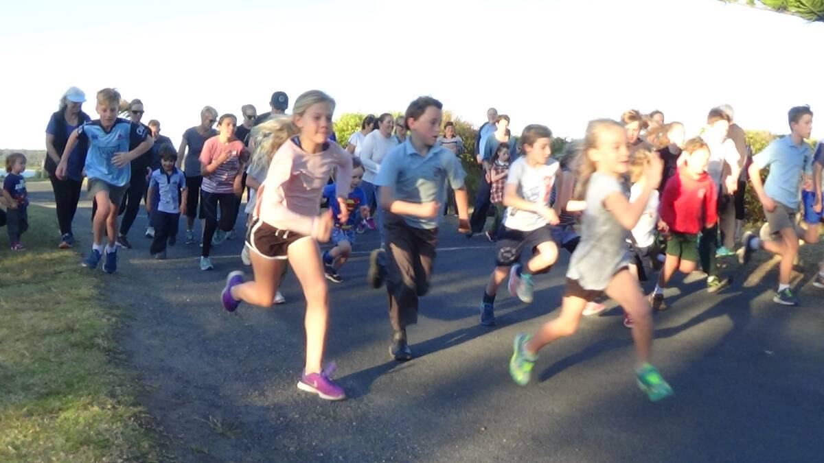 AND THEY'RE OFF: Some 71 runners hit the road on Wednesday, despite the wind.