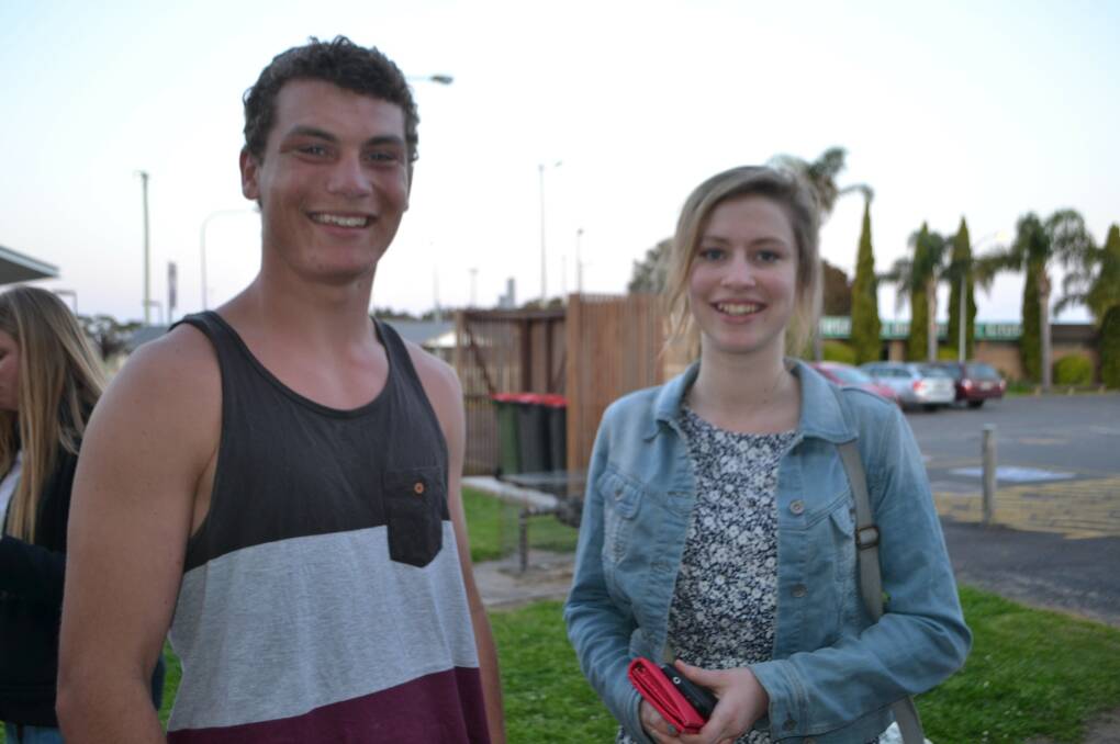 MEDIA STORM: Siblings Elijah and Madeline Woods. Elijah has defended his sister, who was fired from her Canberra job over a Facebook filter saying it was okay to vote "no" in the marriage equality survey.