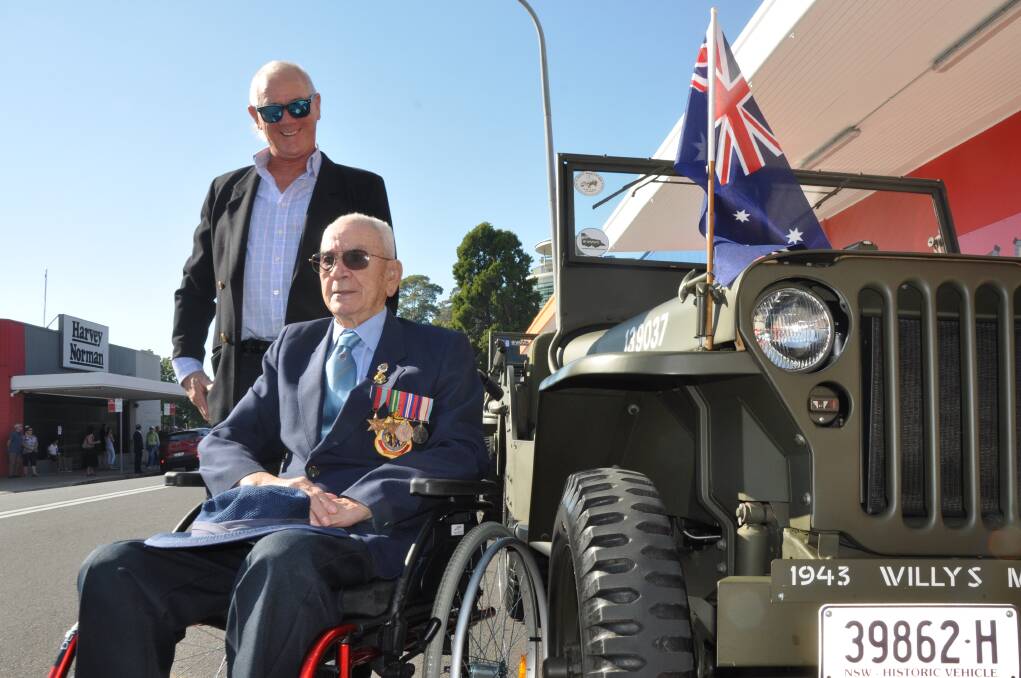 VICTORY IN THE PACIFIC: Harold Barkley, then president of Moruya RSL Sub-branch, with his son Paul at the 2018 march in Batemans Bay. He will lay a wreath in Moruya on Saturday, but Moruya sub-branch organisers request the public not attend, due to the risk of COVID-19. PICTURE: Kerrie O'Connor.