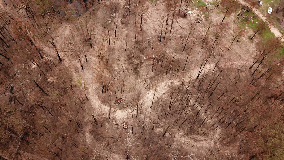 SCORCHED EARTH: A drone shot showing the damage of the fire as it roared through from the north. Picture: STACK SPACE.