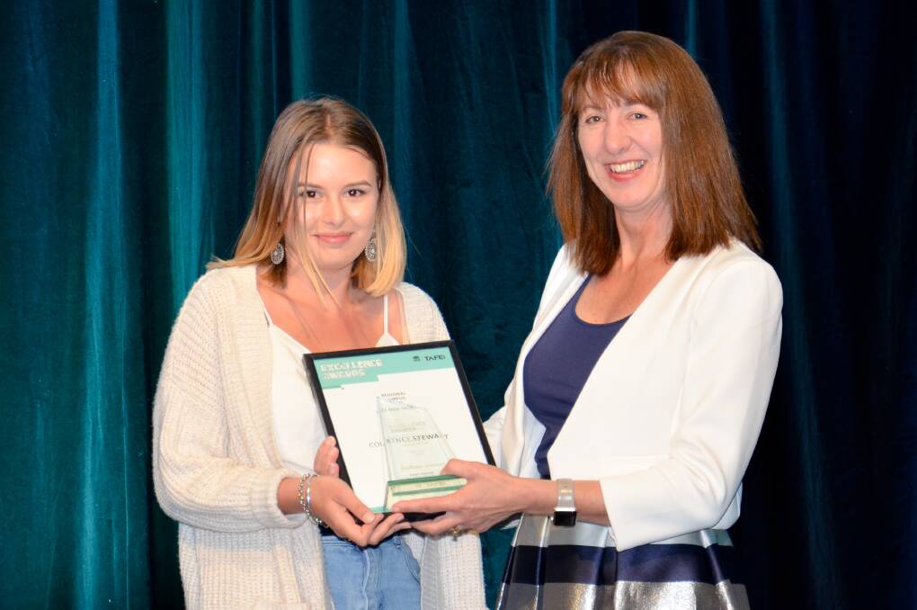 BRIGHT SPARK: Illawarra Forum CEO Nicky Sloan presents Courtney Stewart with the Moruya TAFE Campus Student of the Year Award.