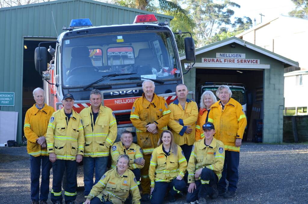 FIREFIGHTERS: Nelligen's Rural Fire Service crew defended their village and their own homes. Some lost their homes. PICTURE: Andrea Cantle.