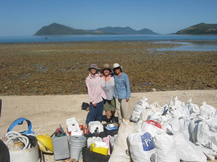 DAUNTING TASK: Bernadette Davis, Sam Ricza and Anita Doughty helped collect one tonne of rubbish washed up on the southern side of Orpheus Island in the Great Barrier Reef.