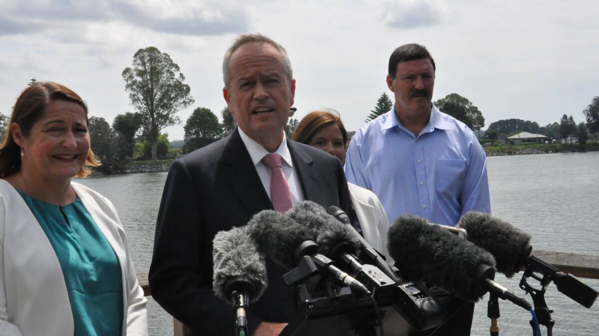 PRINCES HIGHWAY: Federal Opposition Leader Bill Shorten answers questions on the banks of the Moruya River on Tuesday, February 5.