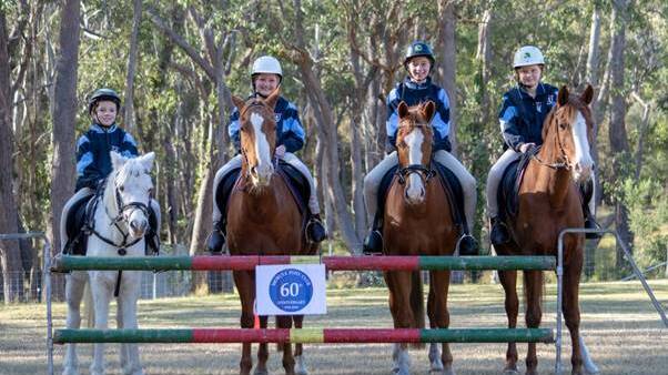 NEXT GEN: Moruya Pony Cub has much to honour in the past and much to smile about now. Finn Kay on Bonnie, Chelsea Nickson on Ginger, Stephanie Ovington on Charlie and Leila Salter on Amira.