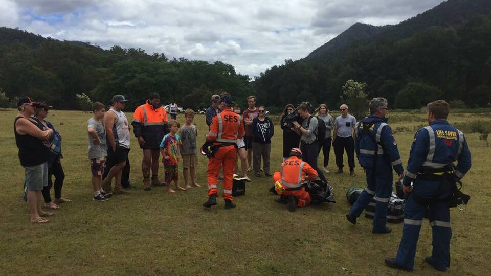 A baby is among 41 people stranded in remote flooded campground west of Moruya. Supplies were delivered on January 7 by helicopter and other crews.