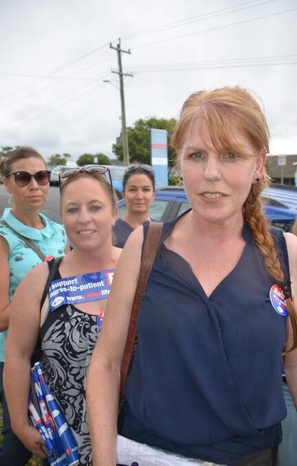 Mary Hropic speaking on behalf of members of the Moruya branch of the NSW Nurses and Midwives Association on December 19. In the background are Hayley Stewart, Rachael Rogan and Georgie Rowley.