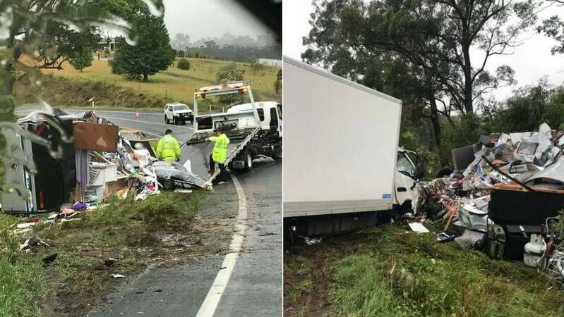 FIX IT NOW: A head-on crash between a truck and car towing a caravan earlier this year on the Princes Highway.