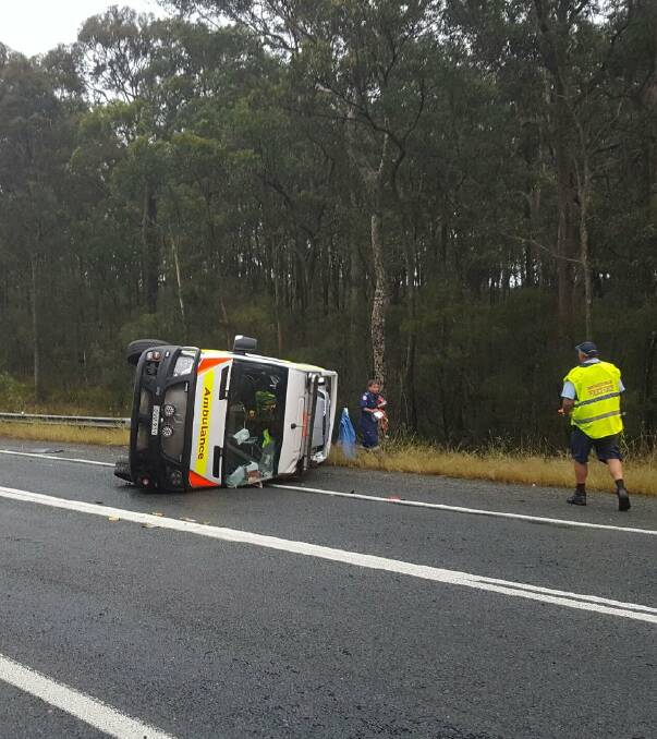 ANOTHER CASUALTY: A crew of paramedics was yet another casualty of the Princes Highway this week, overturning near Mogo. Picture NSW Police.