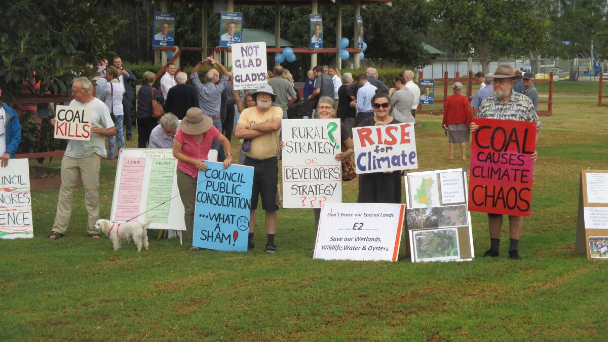 COLD ON POLICY: Climate protesters crashed Bega MP Andrew Constance's election campaign launch on Wednesday.