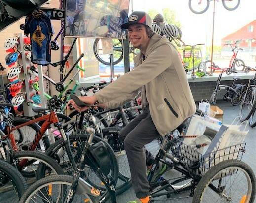 100 per cent: Peter Vassallo's loves of tinkering with his trike has turned into paid work, thanks to Moruya Cycles and The Disability Trust.