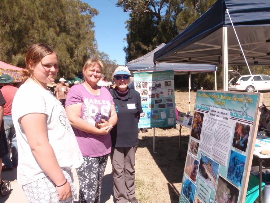 SUPPORTERS: Ruby Wiggins, of Moruya and Margaret Eldridge, of Broulee, were two of the many supporters of sanctuary zones at Art on the Path. They are pictured with NCMG’s Fran Anderson.