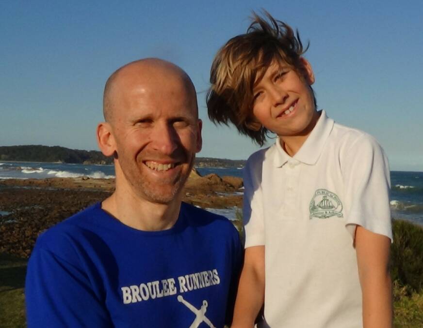 FAMILY EVENT: Australian Triathlon representative Dan Lloyd-Jones and his son Monty at Wednesday's Broulee Runners event.