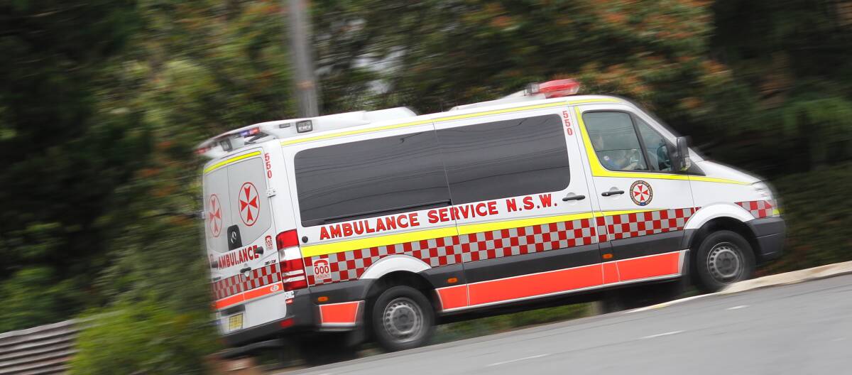 Paramedics treated a woman at the scene of a Princes Highway crash on Tuesday, March 19. File picture.