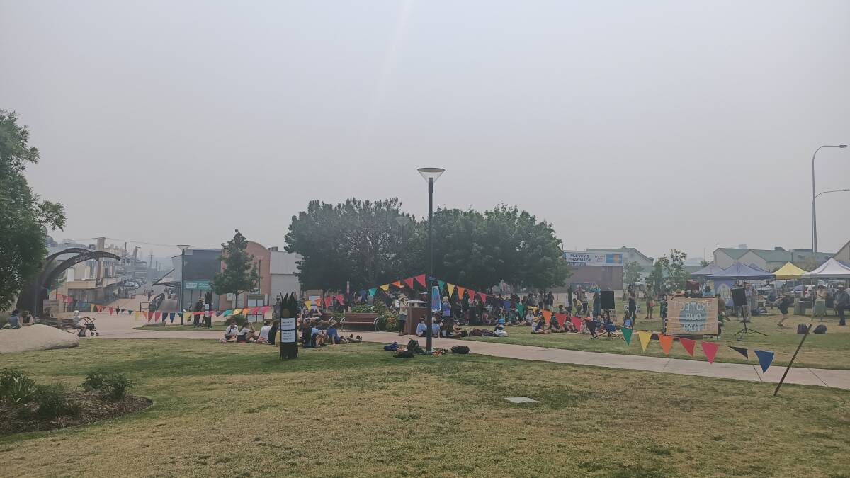Schools Strike for Climate supporters in Bega's Littleton Gardens on Friday as a thick pall of smoke clouds the district. Photo: Ben Smyth