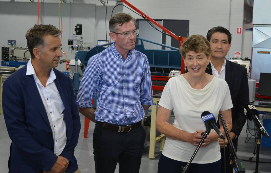 Fiona Kotvojs in Bega on Friday, December 17, alongside outgoing Bega MP Andrew Constance, NSW Premier Dominic Perrottet and Minister for Skills and Tertiary Education Geoff Lee. Photo: Ben Smyth