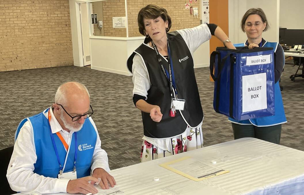 Bega electoral manager Fay Steward draws candidates names in Thursday's official ballot draw for the March 25 state election. Picture by Ben Smyth