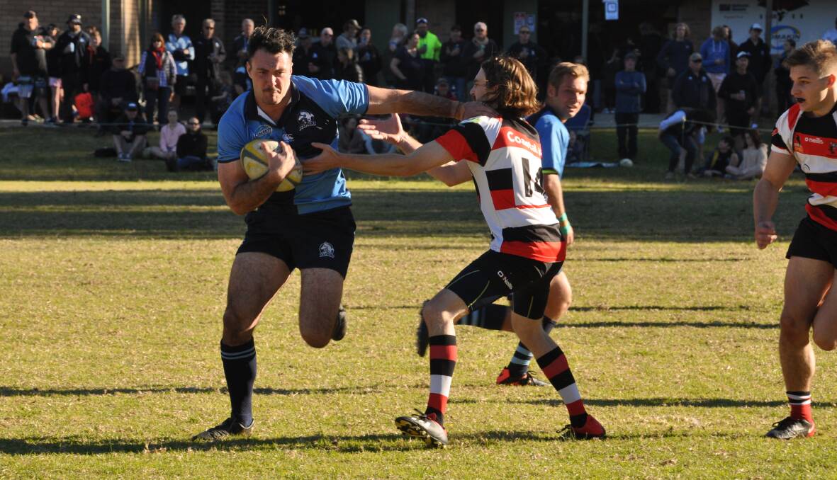 Broulee Dolphins' Robbie Hogg makes a run against Batemans Bay at Captain Oldrey Park in 2019. Photo: Supplied