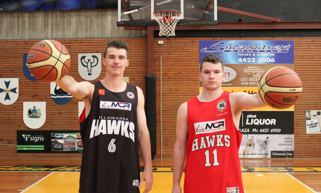 FLYING HIGH: South Coast basketballers Riley O’Shannessy and Gavin Costain in their Illawarra Hawks gear. Photo: Fiona Costain.