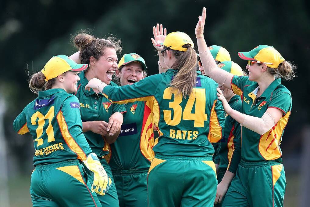 Sam Bates (34) and her Tigers celebrate a wicket during the recent WNCL. Photo: Cricket Tasmania