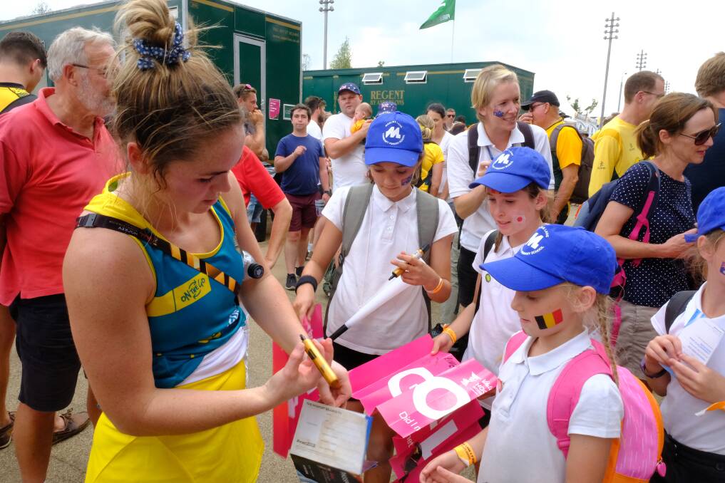 Hockeyroos' Kalindi Commerford signs autographs for young fans. Photo: SUPPLIED
