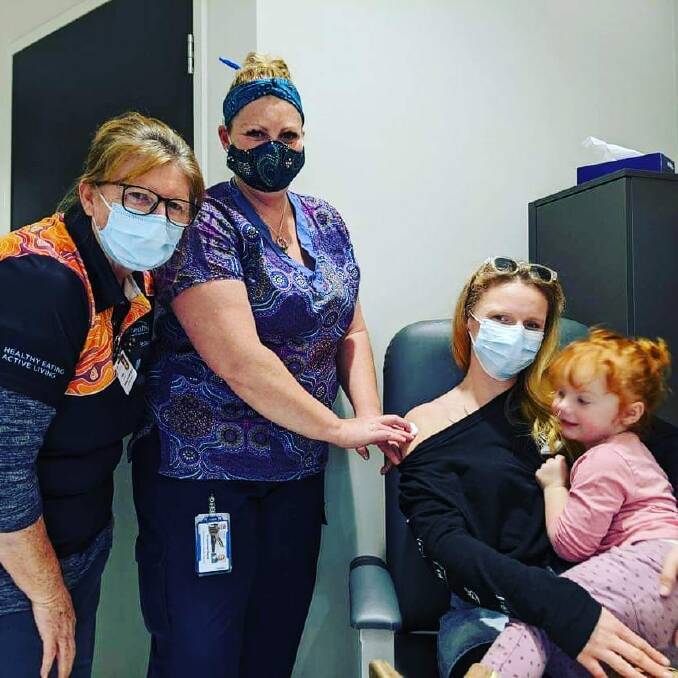 Southern NSW Local Health District's director of Aboriginal Health, Jackie Jackson, and her family recieve their COVID-19 vaccination. 