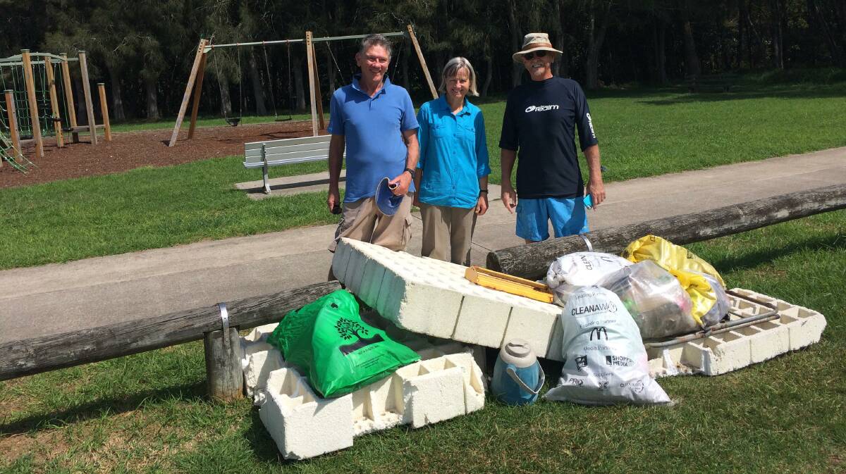 Tomakin residents Patrick Wheelahan, Helen Ransom, Bruce Johnston at last year's Clean Up Australia Day.