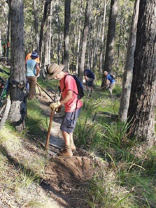 The Narooma Mountain Bike Club's keen trail technicians spend hours making sure the trails are safe and in good condition. 