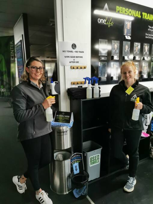 Stay Safe: Sandi Paull and Skye Falzon at One Life Gym's sanitation station, set up to be more enviro-friendly and meet the COVID-19 rules and regulations.