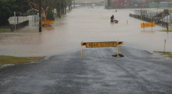 FLASHBACK: McMillan Road at Narooma during a flood in 2014. Photo: Dave Moran