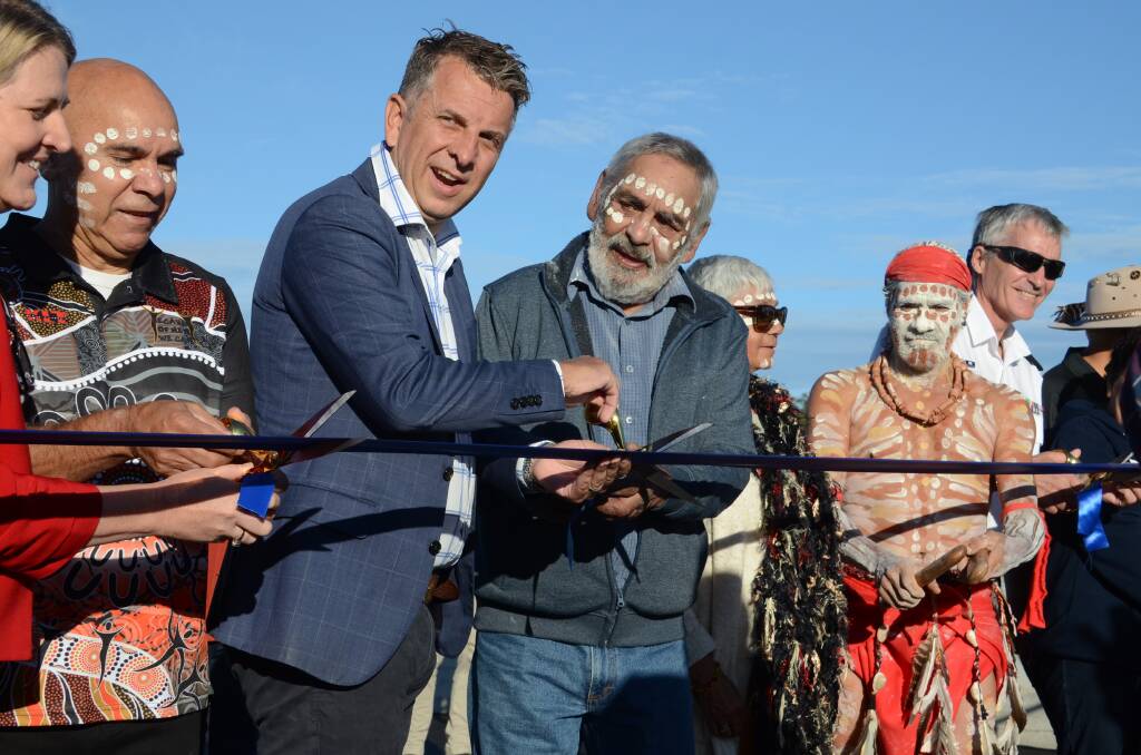 Bega MP Andrew Constance cuts the ribbon with Yuin Elders on the opening day of the Batemans Bay Bridge earlier this year. 