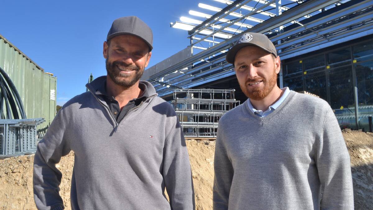 REDEVELOPMENT: Narooma Plaza manager Mark Anderson and assistant manager Dan Greenlees at the development site.