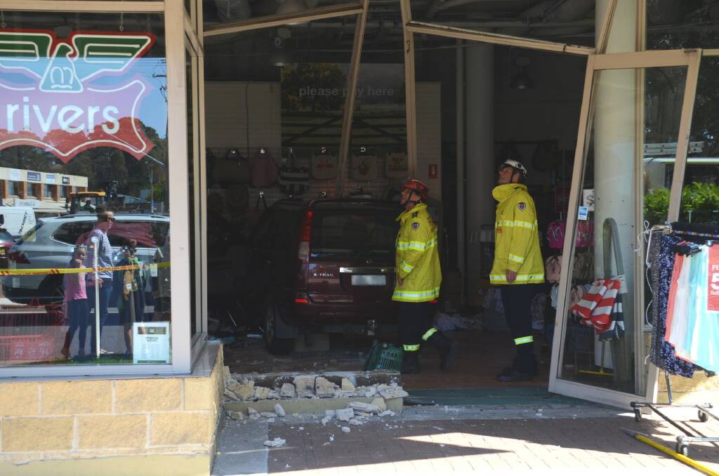 Batemans Bay Fire and Rescue crews at the scene of the crash on Thursday, October 3.