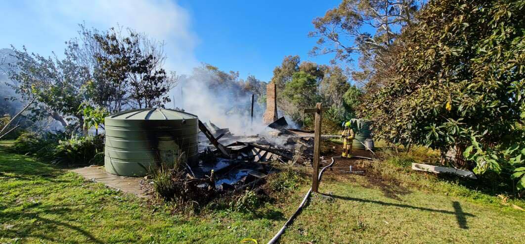 The home on North Head Drive left in ruins after a fire on Sunday, August 15. Image: Moruya Fire and Rescue. 