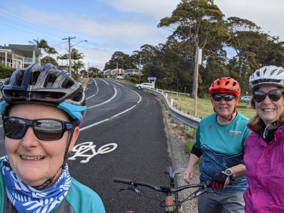 Eurobodalla Council's road safety officer Kate McDougall (right) with Batemans Bay Cycles owners Vicki and Kate test the new bike lanes on Beach Road. In a regional first, new line marking allows on-road cycling to connect Batehaven with Surf Beach, and the Bay CBD.