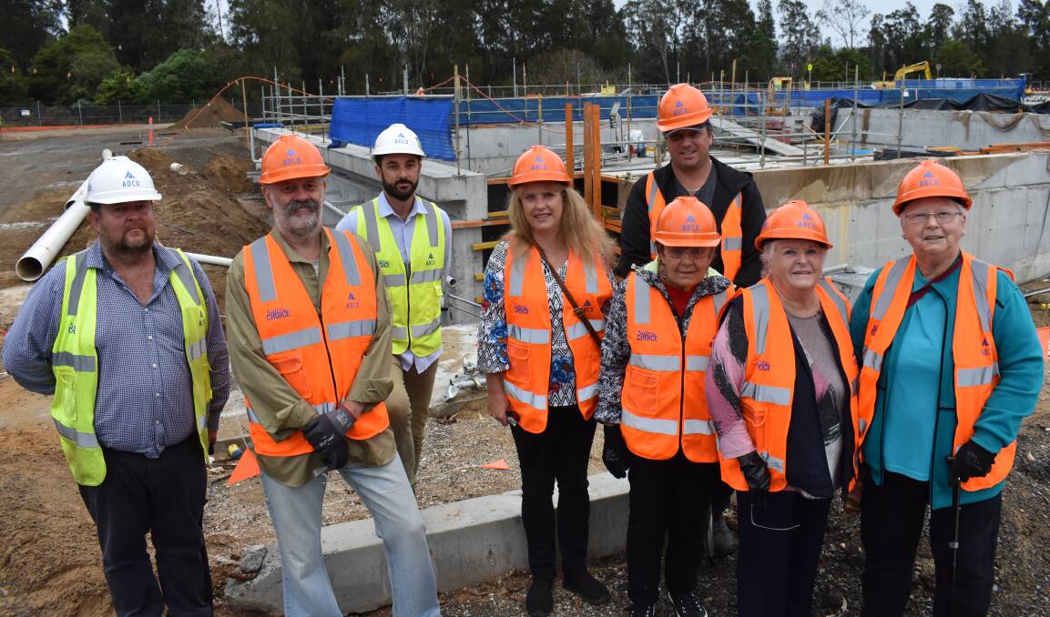 Sneak peak: ADCO's Mick Butterworth and Nick Lyons with members of the Batemans Bay Indoor Aquatic Centre committee touring the site mid-March. Image: Council.