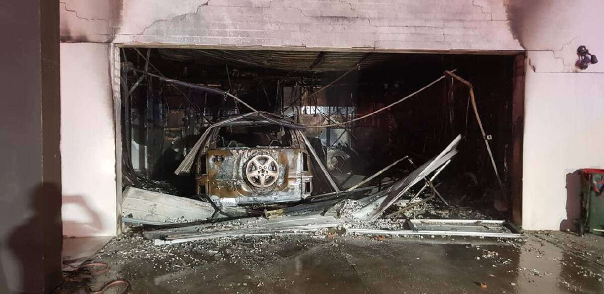 A car and garaged destroyed by fire on Tuesday, November 5. Photo: Batemans Bay Fire and Rescue.