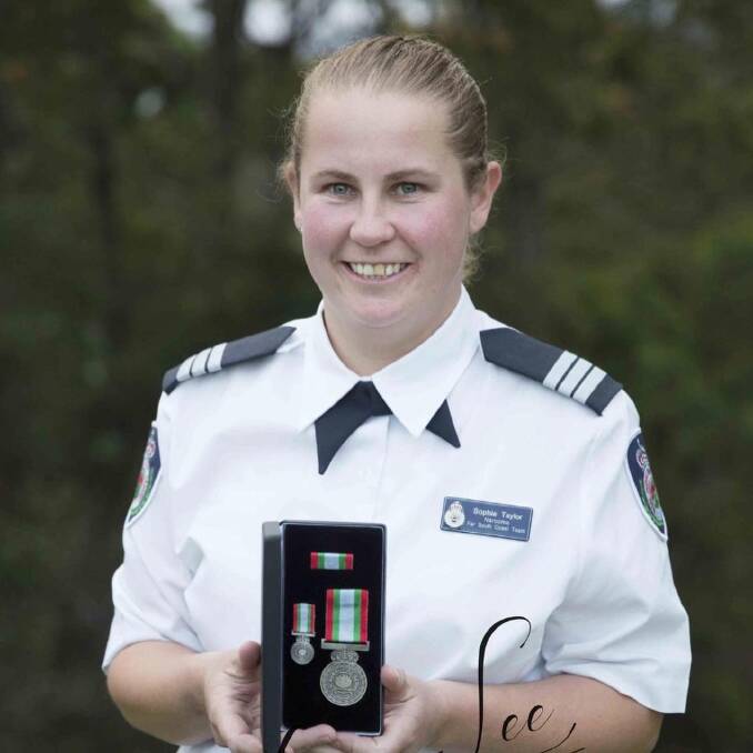 Captain Sophie Taylor with her long service medal. Photo: Amy-lee Photography.