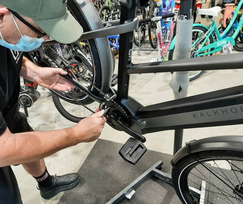 A brand new e-bike gets a few adjustments from the servicing team at Ultimate Cycles in Nowra.