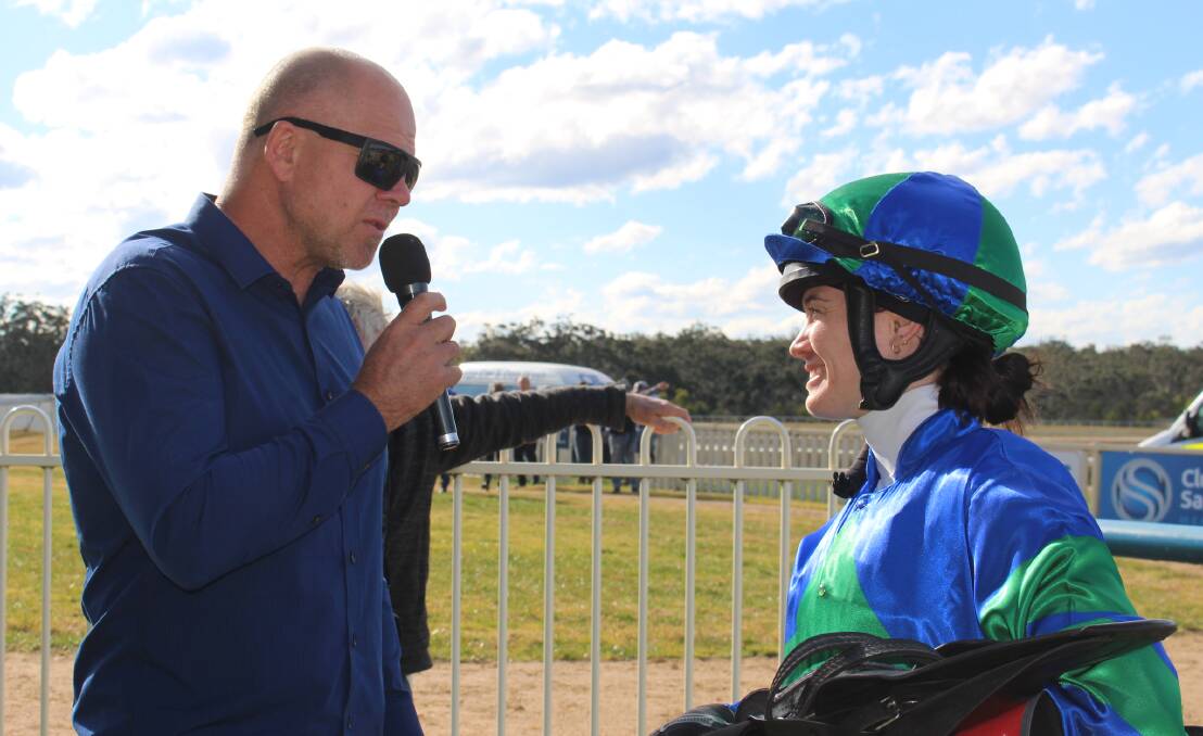 Rob Tweedie congratulates winning jockey Jess Taylor riding horse Caccini. 