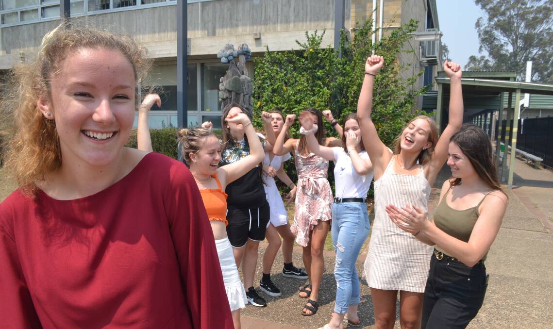 HAPPY DAY: Bridget Lunn was all smiles on the morning of December 17 when the HSC results came out, but the day only got better when she received an ATAR of 99 that afternoon. She is pictured with fellow Moruya High School students.