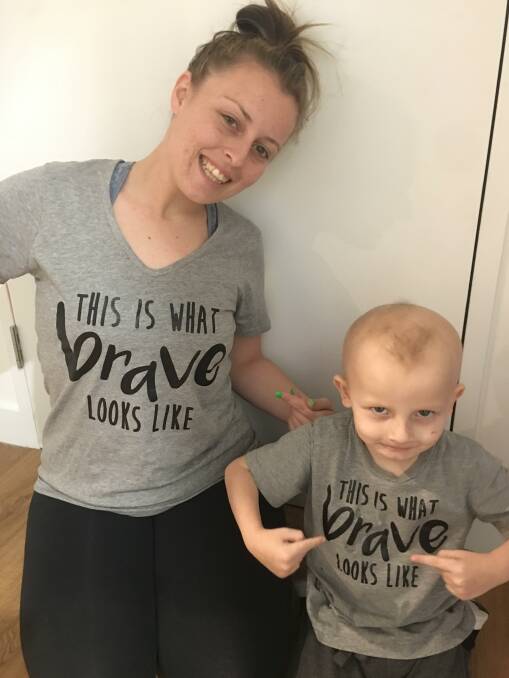 Mother Hannah White and Joshua in their cool new shirts. 
