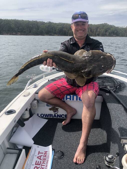 Mal Gilham of Tuross Head with his winning flathead in 2020. Image: Supplied. 