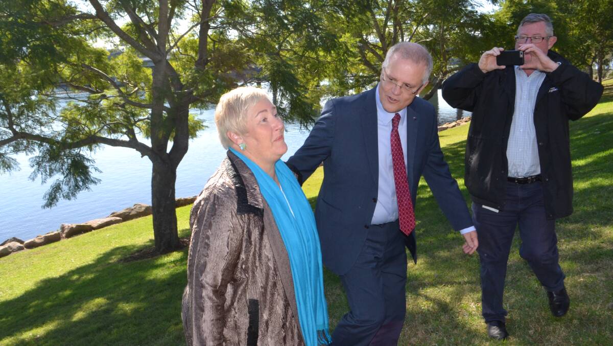 SUPPORT: Gilmore MP Ann Sudmalis with Treasurer Scott Morrison in Nowra on Thursday morning. Mr Morrison gave his full support to the MP, who is facing a preselection challenge. Photo: Rebecca Fist