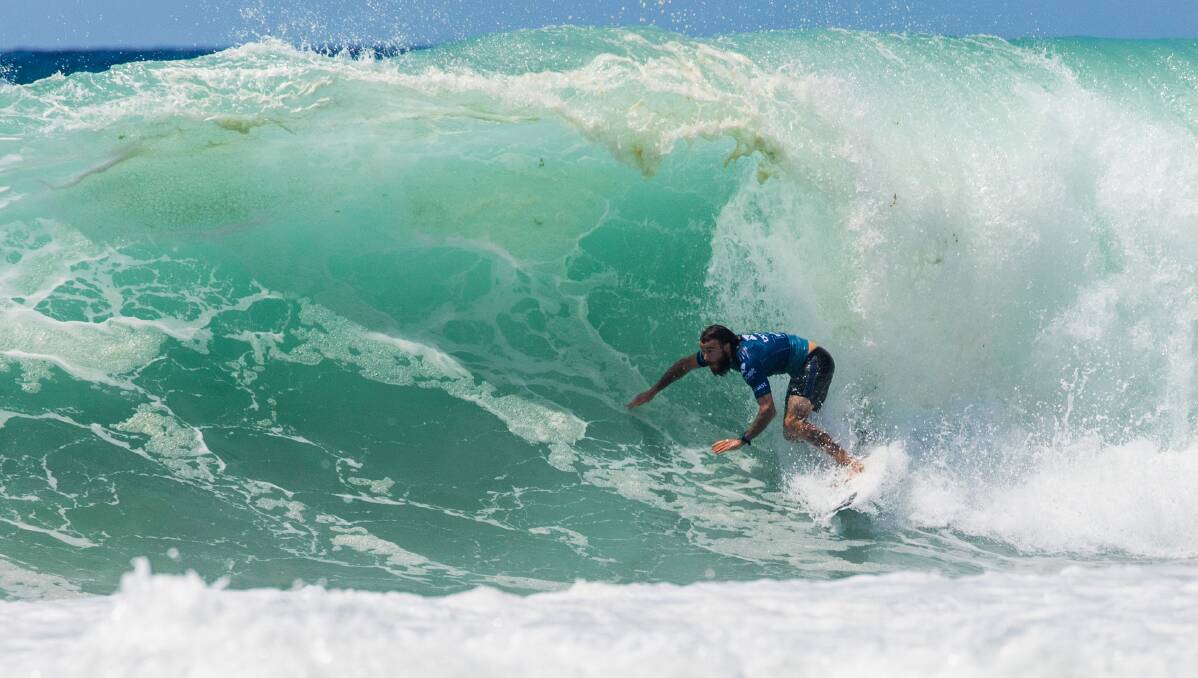 In his element: Culburra surfer Mikey Wright rides a wave, while he was involved in a daring surf rescue on Oahu's north shore on the weekend. Picture: WSL/Cestari 