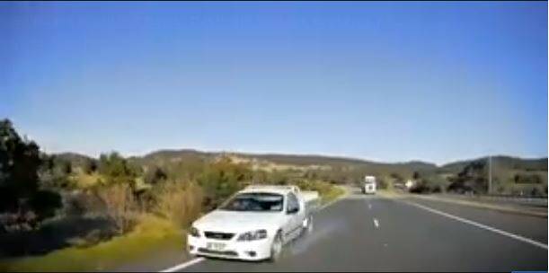 NEAR MISS: Police have labelled a video of a driver performing a U-turn into oncoming traffic as an act of stupidity. Photo: Dash Cam Owners Australia