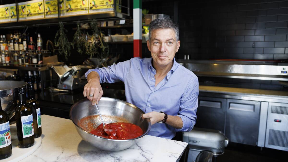 Pasquale Trimboli goes through about 150kg worth of canned tomatoes a week. Picture by Keegan Carroll